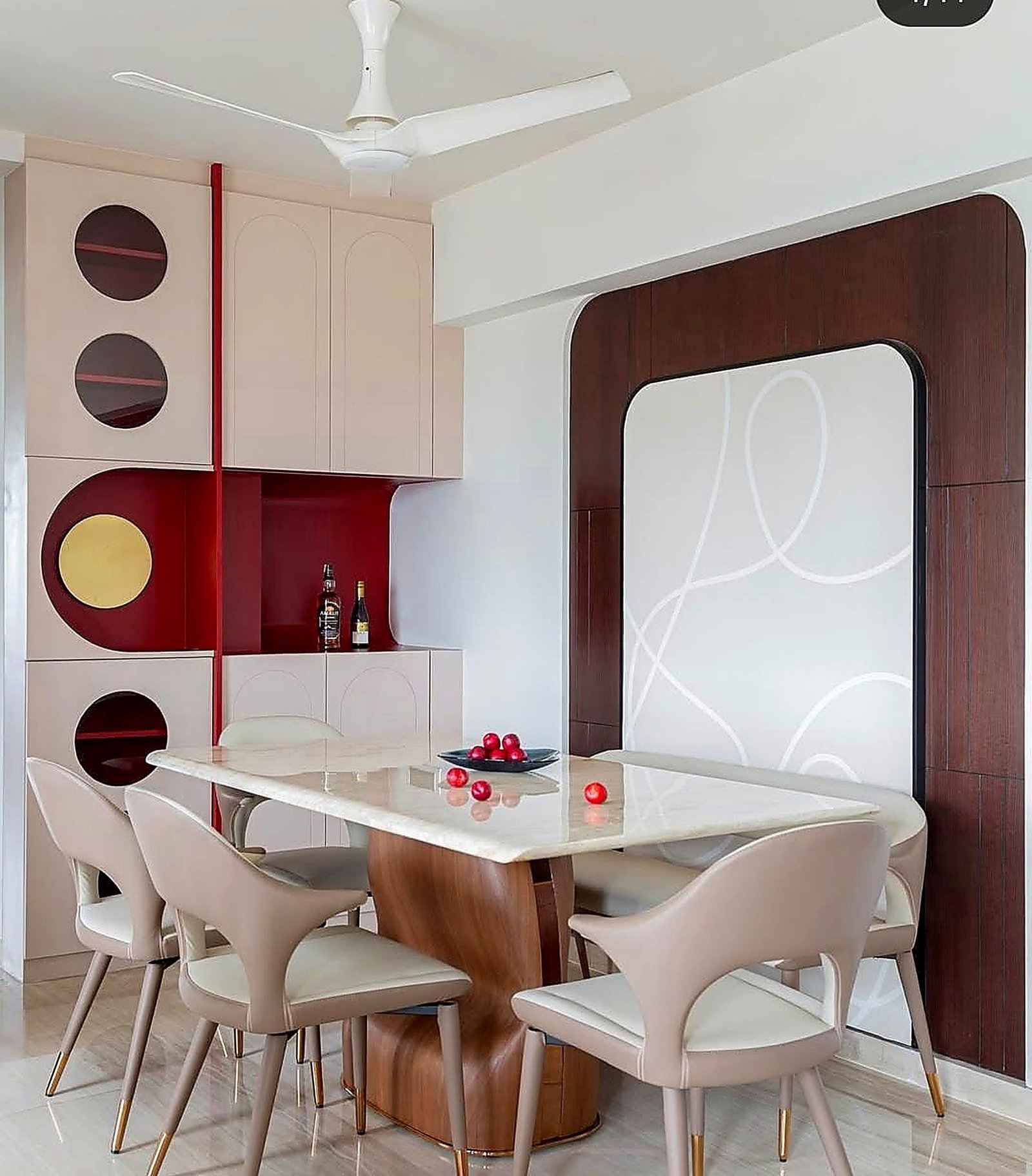 Dining nook with red and brass niches