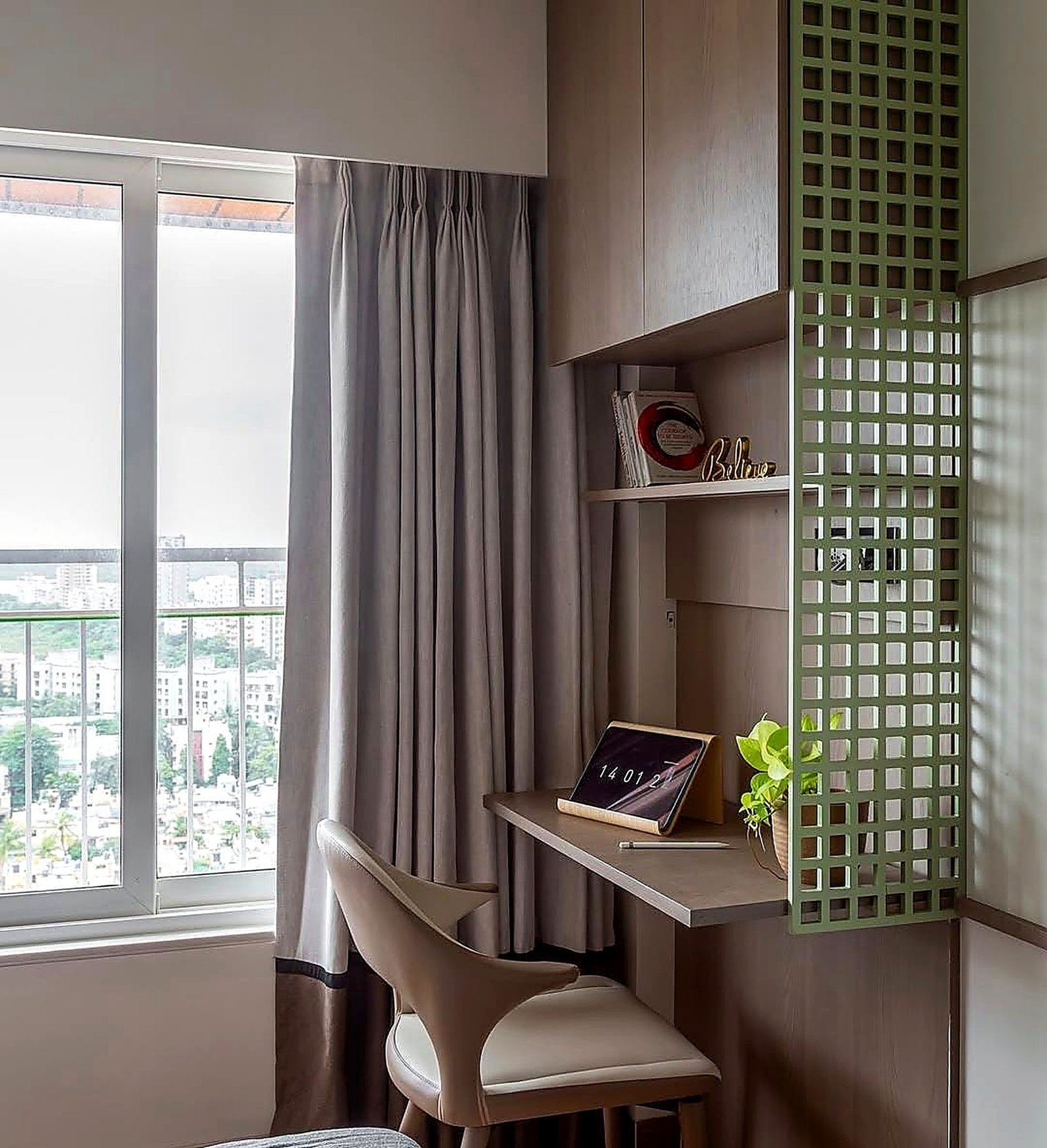 Study nook with a sage lattice screen